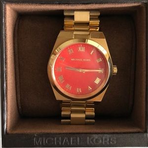 Michael Kors Gold watch with Coral/Orange face